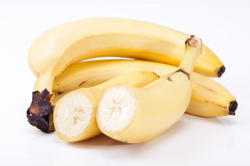 group of fresh fruits of yellow banana  on white background