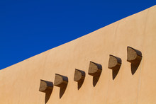 Vigas And Adobe Walls Are Pueblo Revival Building Elements Seen In Santa Fe, New Mexico