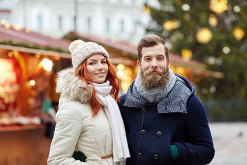 Wall Mural - happy couple walking in old town