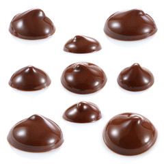 Wall Mural - Drops of liquid chocolate isolated on white background. Collecti