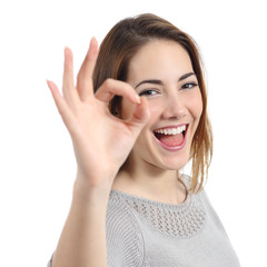 close up of a happy woman making ok gesture