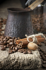 Wall Mural - Coffee beans with spices and cezve