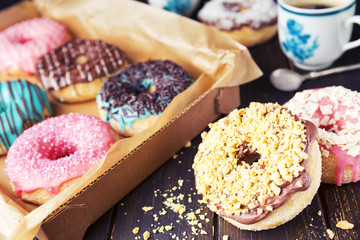 Wall Mural - Fresh homemade donuts with various toppings