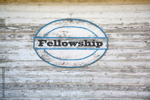 Fotografie, Tablou Fellowship concept - road sign on shed side