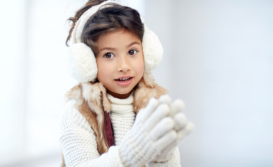 Sticker - happy little girl wearing earmuffs