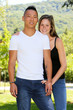 © AGDER - Mixed young couple in a park