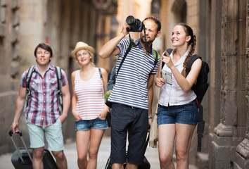 Wall Mural - Company of  travelers taking shots