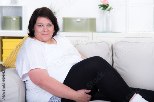 Ubergewichtige Frau Auf Dem Sofa Buy This Stock Photo And Explore Similar Images At Adobe Stock Adobe Stock