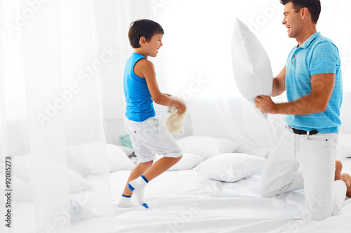 Father And Son Having Fun Pillow Fight Buy This Stock Photo And