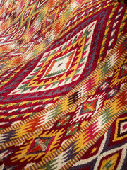 Canvas Print - Close up of handmade traditional wool rug