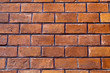 background of red old brick wall close up