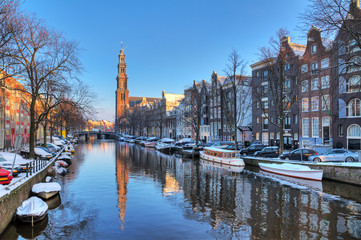 Wall Mural - Beautiful early morning winter view on the Westerkerk and the Prinsengracht, one of the Unesco world heritage city canals of Amsterdam, The Netherlands. HDR 