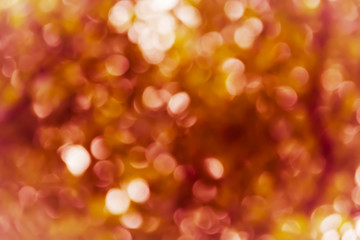 Wall Mural - glow light orange and golden colour bokeh flexible used for abstract background 