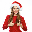 © Yuriy Shevtsov - smiling Santa girl thumb up show.