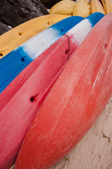 Wall Mural - Colorful kayaks on beach in Thailand