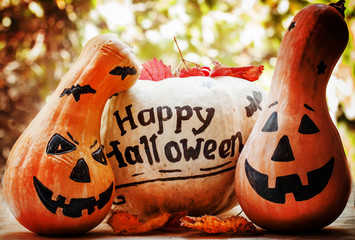 Halloween pumpkin on old wooden background, dark toned image, se