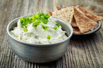 cream cheese with green onions and herbs