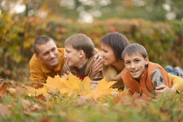 Wall Mural - Happy family in autumn forest