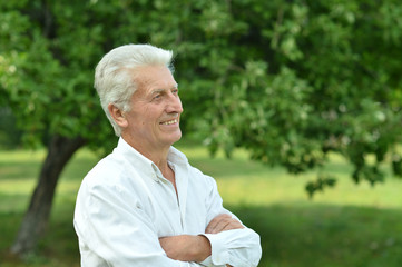 Senior man  in summer park