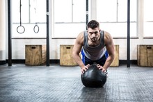 Fit Man Working Out With Ball