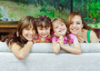 © Fotos 593 - Two proud hispanic mothers posing with their daughters, heads