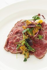 Wall Mural - beef carpaccio plated appetizer starter