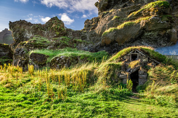 Wall Mural - Little Shack in the mountains in Iceland