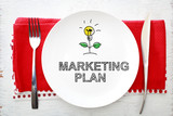Fototapeta  - Marketing Plan concept on white plate