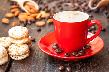 Wall Mural - Red cup of coffee and macaroons