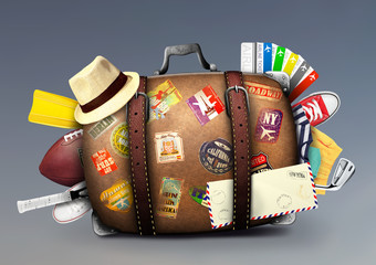 Wall Mural - full suitcase of a traveler with travel stickers