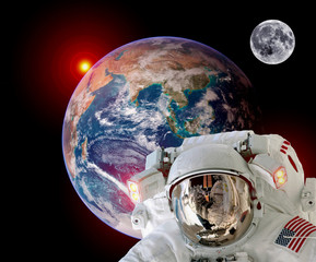 Wall Mural - astronaut spaceman isolated helmet outer space earth satellite moon sun. elements of this image furn