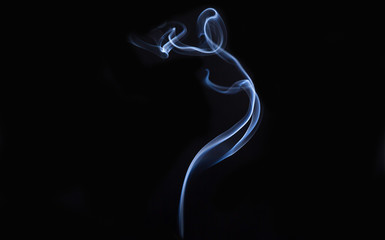 colored smoke isolated on black background