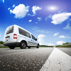 Canvas Print - The Motion blurred car on asphalt road