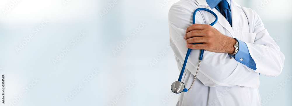 Doctor in front of a bright background - obrazy, fototapety, plakaty 