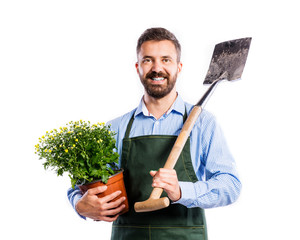 Young handsome gardener