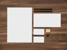 Letterhead, Envelope And Blank Business Cards On Wooden Desk.