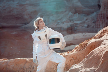 Wall Mural - futuristic astronaut without a helmet on another planet, image