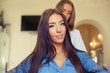 © jakubzak - Hairdresser doing haircut for women in hairdressing salon. Concept photo.