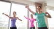 © Syda Productions - group of happy women working out in gym