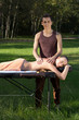 © PaulShlykov - A good-looking man doing a back massage