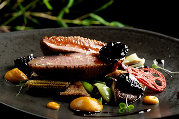 Wall Mural - Haute cuisine/Asian fusion, roasted duck with plums and shiitake mushrooms