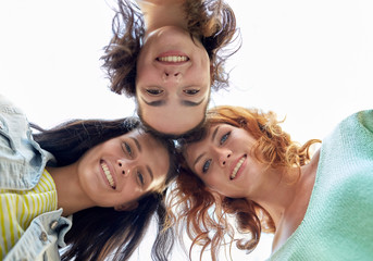 Wall Mural - happy young women or teenage girls in circle