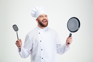 Sticker - Laughing male chef cook holding spoon and pan