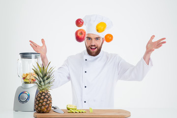 Sticker - Portrait of a hapy male chef cook juggle with fruits