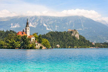 Wall Mural - Catholic Church on Island on Bled Lake and Bled Castle