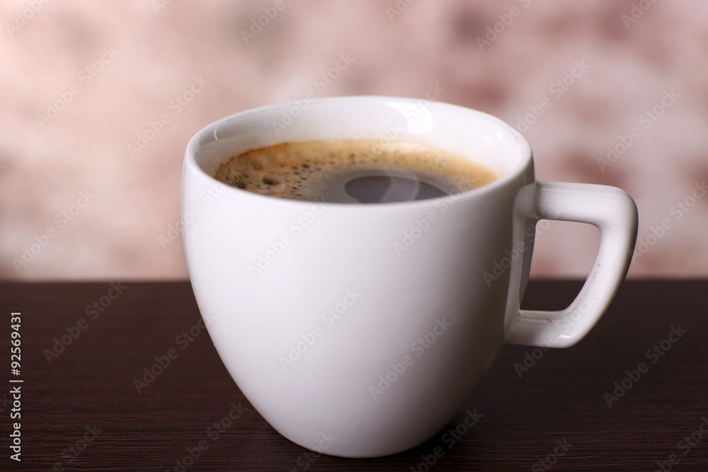 Cup of coffee on table close up