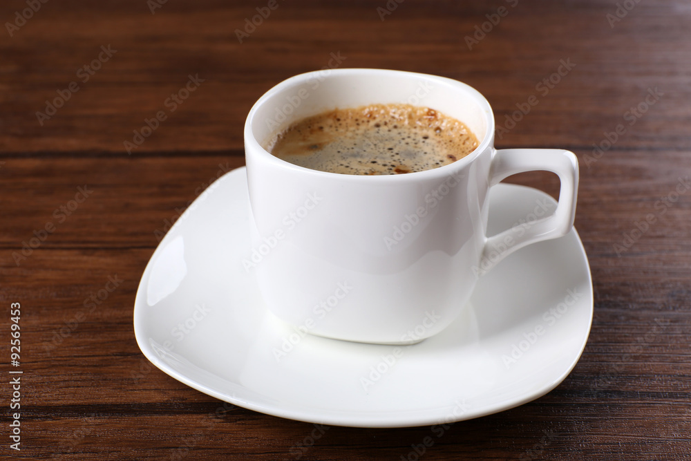 Cup of coffee on table close up