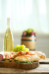 Fototapete - Still life with various types of Italian food and wine