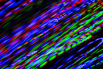 Wall Mural - colorful bright night lights over black background