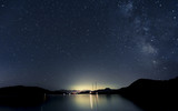 Fototapeta Kosmos - Stars and boats at night